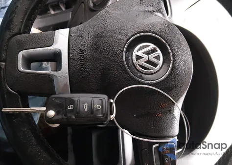 2014 Volkswagen Golf 2.0L Tdi z USA, uszkodzony, nr VIN WVWNM7AJ4EW008813